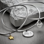 personalised set of three sterling silver charm bangles