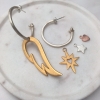 sterling silver hoop earrings with gold wing charms