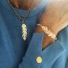 sterling silver and gold feather charm bracelet