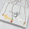 sterling silver and gold heartbeat charm necklace