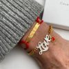 love name plate bracelet sterling silver and gold plate